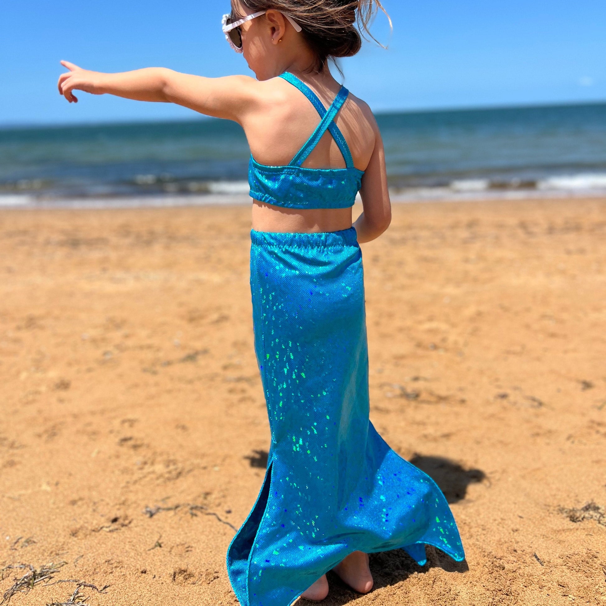 Girl wearing Missty Mermaid Tails Aqua mermaid tail and crop top